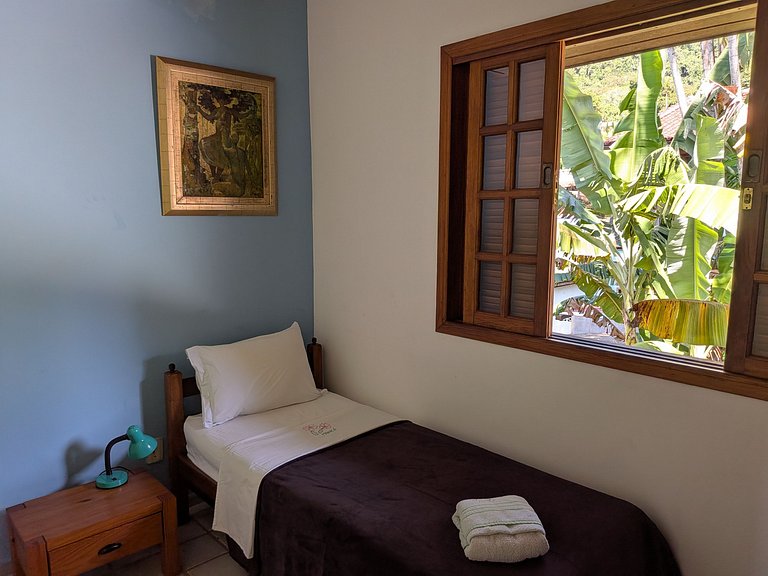 Chambre triple à l'étage supérieur avec vue sur la mer